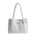 Witte corduroy draagtas voor dames met verticale strepen en een modieus leren label - Wit