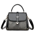 Borsa a mano in pelle nera e tessuto grigio con dettagli dorati vista frontale - Nero e Grigio
