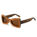 Funkelnde Schmetterlings-Sonnenbrille mit Leopardenmuster und orangefarbenen Strasssteinen - Leoparden-Rahmen / Teebraune Gläser