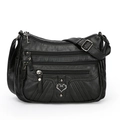 Borsa a tracolla in pelle PU nera con tasche multiple a zip e ciondolo a forma di cuore - Nero