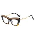 Occhiali cat eye con montatura nera e leopardata e stanghette dorate ondulate - Montatura Marrone-Nero (C1)