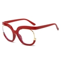 Monture de lunettes rouge et dorée avec design unique en forme de sourcil ondulé - Monture Rouge Jujube