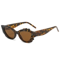 Occhiali da sole cat eye tartarugati con lenti marroni e bordi della montatura seghettati - Regolare / Montatura Leopardata / Lenti Tè