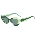 Cat eye sunglasses featuring green translucent frames and decorative shell texture - Regular / Green Frame Grey Lens