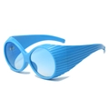 Retro oval oversized sunglasses in bright blue with textured temples and wraparound design - Blue Frame / Blue Lens