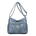 Sac bandoulière bleu Morandi avec texture vintage lavée et plusieurs poches zippées - Bleu