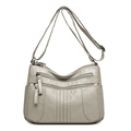Sac bandoulière en cuir PU beige souple avec plusieurs poches zippées et bandoulière - Beige