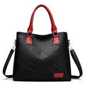 Borsa tote da donna bicolore nero e rosso con goffratura e tracolla rimovibile - Rosso