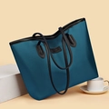Bolso tote azul pavo real en tela oxford con correas de cuero negro y etiqueta - Azul