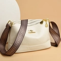 Borsa a tracolla da donna bianco crema con multivani e tracolla in tessuto jacquard - Bianco