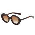 Classic round tortoiseshell sunglasses with brown gradient lenses in a stylish 3/4 view - Leopard Frame Gradient Brown Lens
