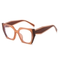 Occhiali anti luce blu cat-eye con montatura geometrica color ambra - Tè Trasparente