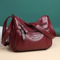 Bolso bandolera de piel roja oscura para mujer con múltiples bolsillos y diseño elegante - Rojo
