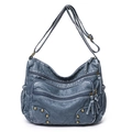 Blue washed PU leather multi-pocket crossbody bag with vintage rivets and adjustable strap - Blue