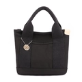 Borsa tote nera minimalista in tela con tasche multiple e ciondolo in metallo retro - Nero
