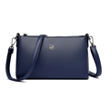 Navy blue crossbody square bag with pebble grain leather and silver geometric hardware - Blue
