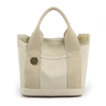 Borsa tote minimalista in tela color crema con ciondolo logo e multitasche - Cachi