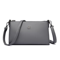 Grey pebbled leather crossbody bag with minimalist silver logo and black metal hardware - Gray