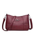 Deep red soft leather handbag for women featuring a minimalist kangaroo metal logo detail - B-Style Red