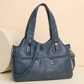 Fashionable grey blue faux leather tote bag with dual handles and crossbody strap - Blue