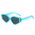 Sky blue geometric triangle sunglasses with dark grey lenses in a minimalist fashion style - Transparent Blue Frame Gray Lens