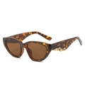 Cat-Eye-Sonnenbrille mit Schildpatt-Rahmen, braunen Gläsern und Goldverzierung - Leoparden-Rahmen / Teebraune Gläser