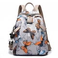 Lightweight grey nylon backpack with butterfly print and teddy bear pendant - Butterfly Print (With Woven Bear Pendant)