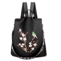 Zaino da donna in nylon nero con elegante ricamo floreale e cinturino Beauty - Nero
