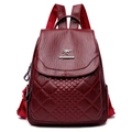 Mochila de piel sintética acolchada rojo oscuro para mujer con logo de canguro metálico - Burdeos