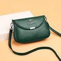 Borsa a tracolla verde scuro in pelle testurizzata con logo a canguro argento - Verde