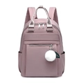 Zaino moderno in nylon impermeabile rosa antico da donna con ciondolo a pompon - Rosa