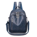Deep blue leather backpack for women with silver zippers and multi-pocket design - Blue