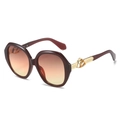 Lunettes de soleil ovales monture bordeaux et verres dégradés orange avec détails dorés - Monture Thé Verres Thé Rose