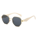 Polygon gold metal sunglasses with dark gray lenses and cream temples in a stylish side view - Regular / Beige Legs Gold Frame Grey Lens
