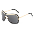Chic Y2K one-piece shield sunglasses with dark lenses and gold metal trim on white background - Gold Frame Grey Lens