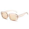 Chic oversized rectangular sunglasses with transparent tea-colored frames and rivet accents - Champagne Frame / Tea Lens