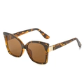 Occhiali da sole cat-eye con montatura tartarugata, lenti marroni e dettagli in metallo oro - Montatura Leopardata Lente Marrone
