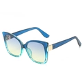 Cat eye sunglasses featuring translucent blue frame and blue-yellow gradient lenses - Blue-Green Gradient Frame Blue Green Lens