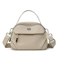 Sac bandoulière en nylon beige avec large sangle et logo d'oiseau métallique - Kaki