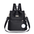Zaino versatile da donna in tessuto Oxford nero con pompon e dettagli dorati - Nero