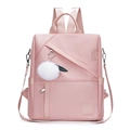 Roze oxford damesrugzak met een witte pluche bal hanger en een ritsvak aan de voorkant - Roze
