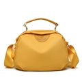 Versatile bright yellow nylon shoulder bag with top handle and crossbody strap - Yellow