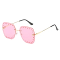 Lunettes de soleil sans monture roses à verres évidés et branches en métal doré - Monture Dorée Verres Roses