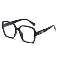 Lunettes carrées avec décor de perles et de roses sur les branches en noir poli - Monture Noire Verres Transparents