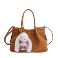 Caramel suede shoulder bag with top handles and a white plush bunny charm accessory - With Plush Pendant Style / Brown