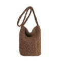 Minimalist coffee brown plush bucket bag with soft texture and matching long strap - Brown
