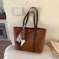 Brown leather tote bag with contrast handles and bear pattern silk scarf accessory - Brown
