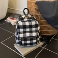 Sac à dos d'hiver en peluche à carreaux noirs et blancs avec détail nœud en cuir - Noir