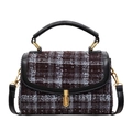 Vintage plaid tweed crossbody handbag with gold clasp and leather strap on white background - Black