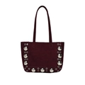 Burgundy suede tote bag with silver studs and long shoulder straps on white background - Red